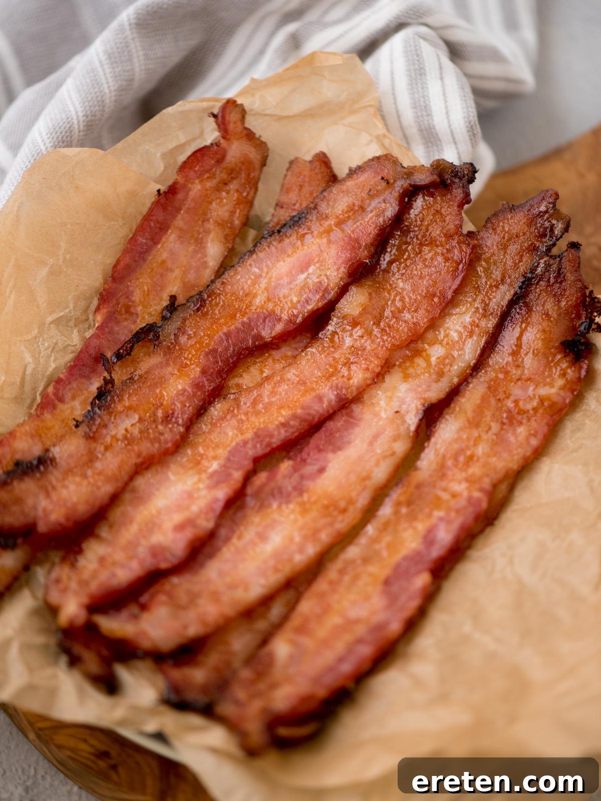 Golden Nectar Bacon 2 Crispy honey bacon served in a parchment paper covered platter.