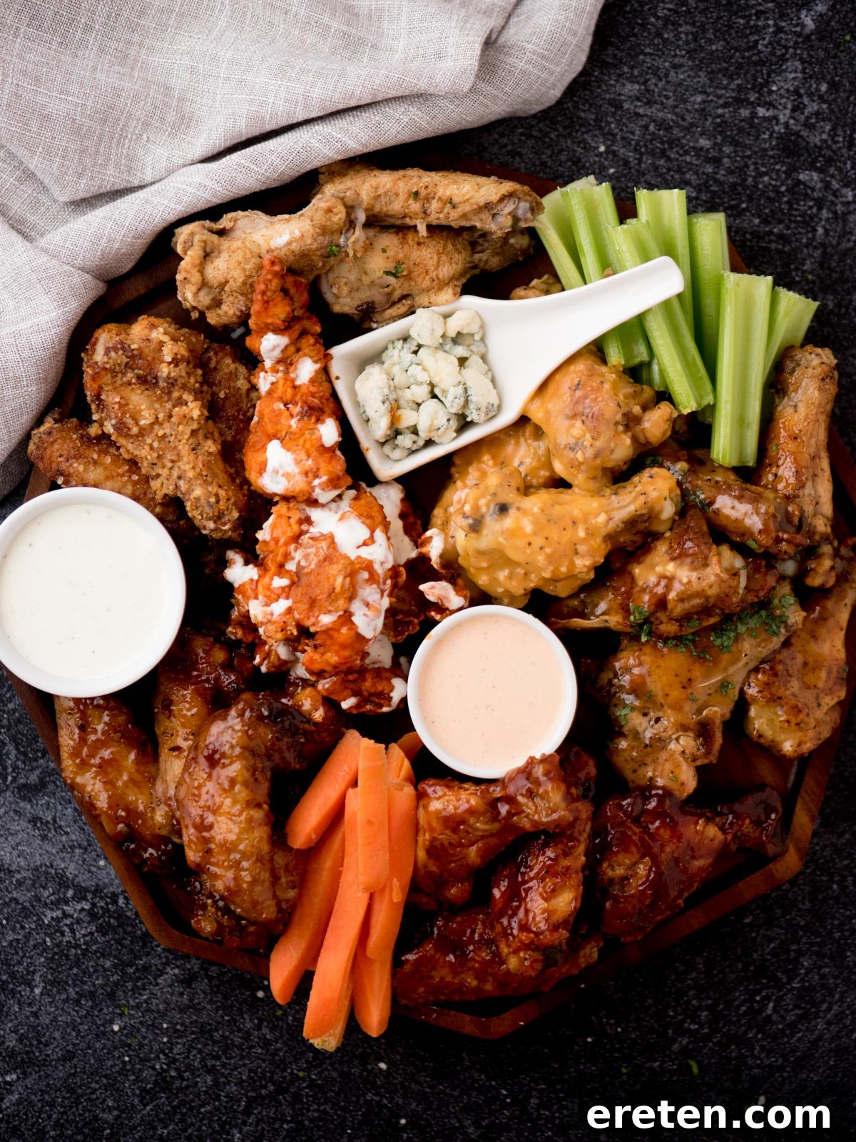 chicken wing charcuterie board surrounded by a dish towel