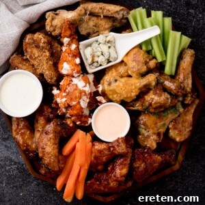 chicken wing charcuterie board platter next to a dish towel
