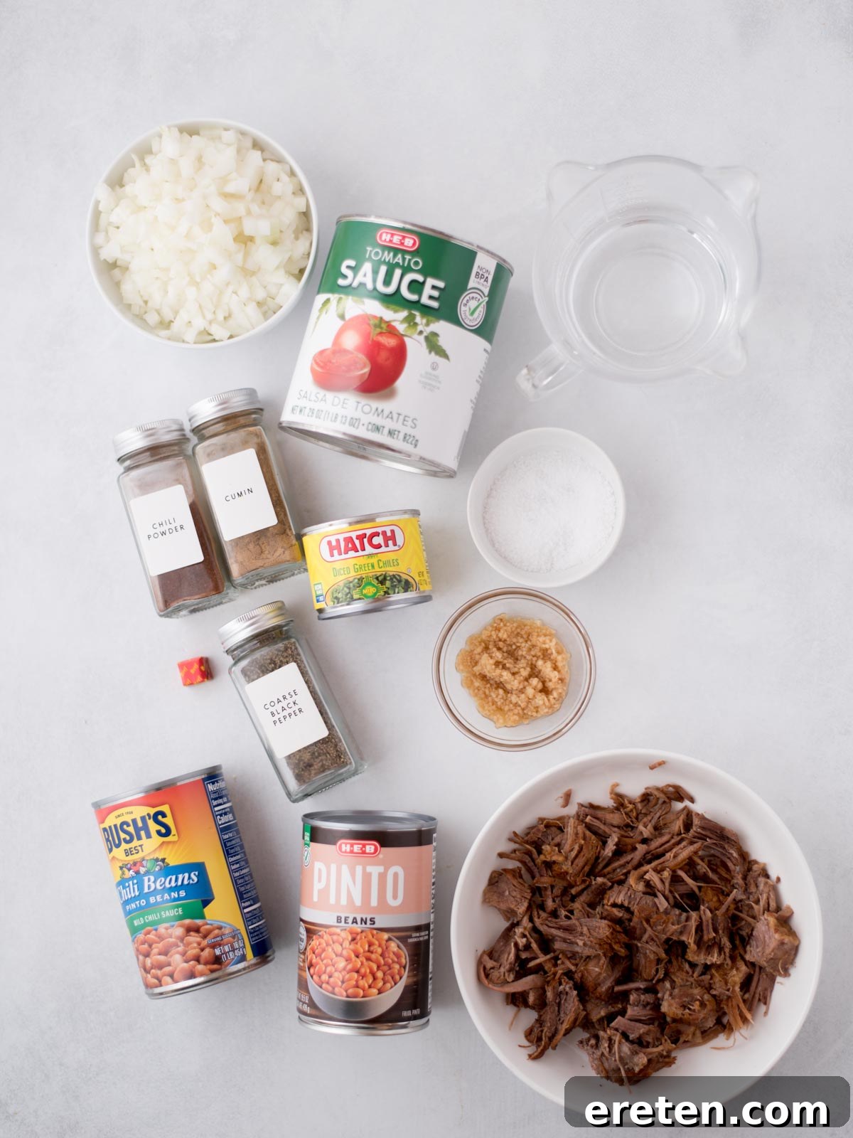 all of the ingredients to make this brisket chili recipe laid out