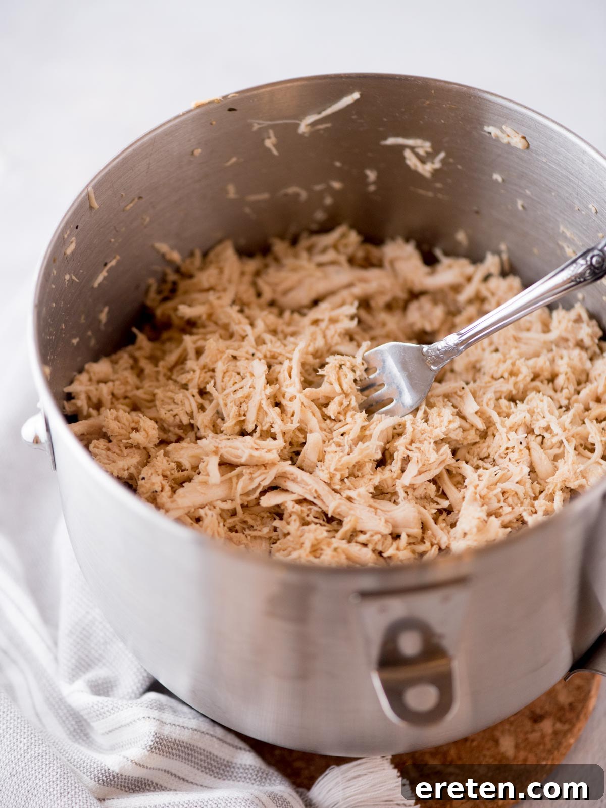 Easy Instant Pot Shredded Chicken 2 Perfectly cooked Instant Pot shredded chicken in a bowl, ready for serving.