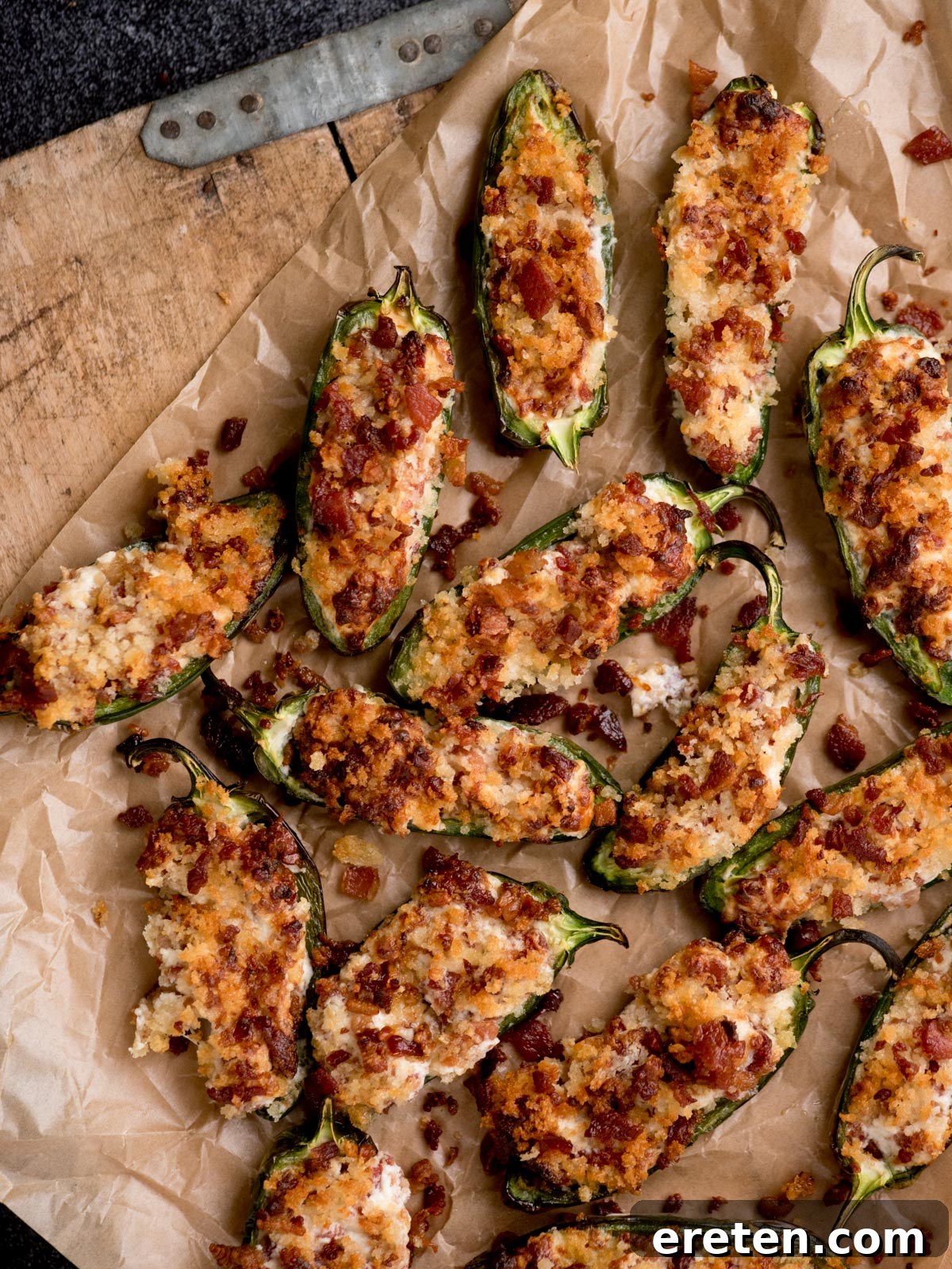 Crispy Air Fryer Jalapeno Poppers on parchment paper, ready to be served
