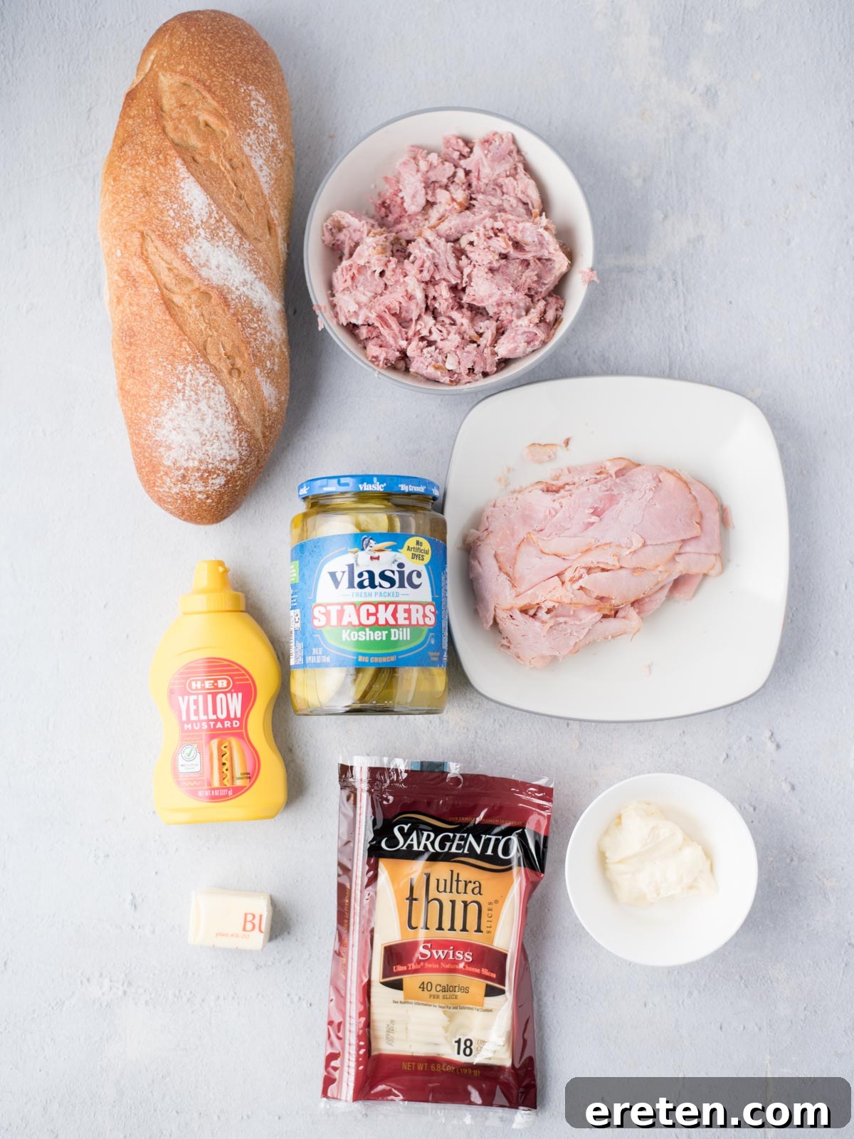 Effortless Classic Cuban Sandwich 3 ingredients to make a cuban sandwich laid out on a table