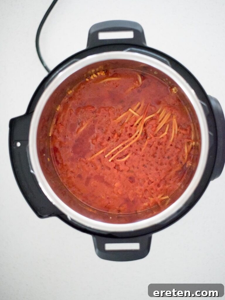 Hearty Instant Pot Spaghetti with Savory Meat Sauce 8 Instant Pot spaghetti cooked before stirring