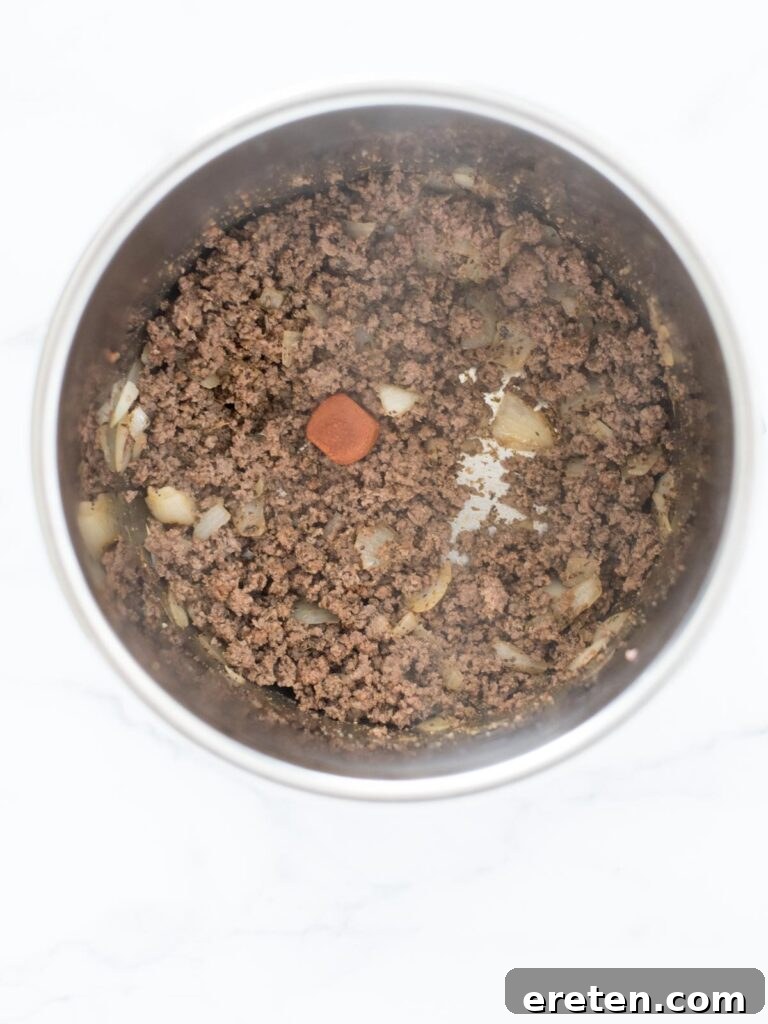 Homemade Instant Pot Cheeseburger Mac 5 tomato bouillon added to instant pot
