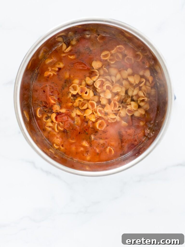 Homemade Instant Pot Cheeseburger Mac 9 completed Instant Pot Ground Beef and Pasta in the instant pot before stirring