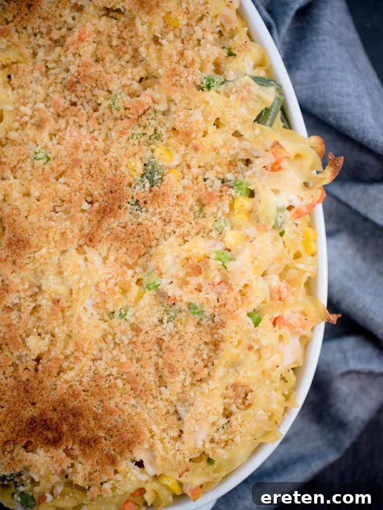 Creamy Chicken Noodle Pot Pie Casserole 5 chicken noodle casserole in white baking dish, ready to be served