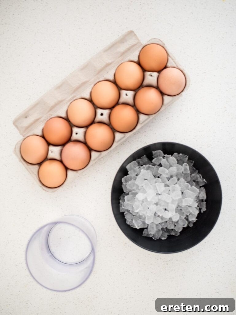 Foolproof Hard Boiled Eggs in Instant Pot 3 Two simple ingredients: water and eggs, laid out on a kitchen counter, ready for Instant Pot cooking.
