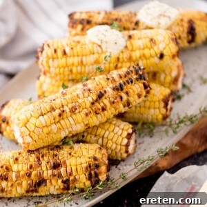 Grilled corn on the cob on a plate