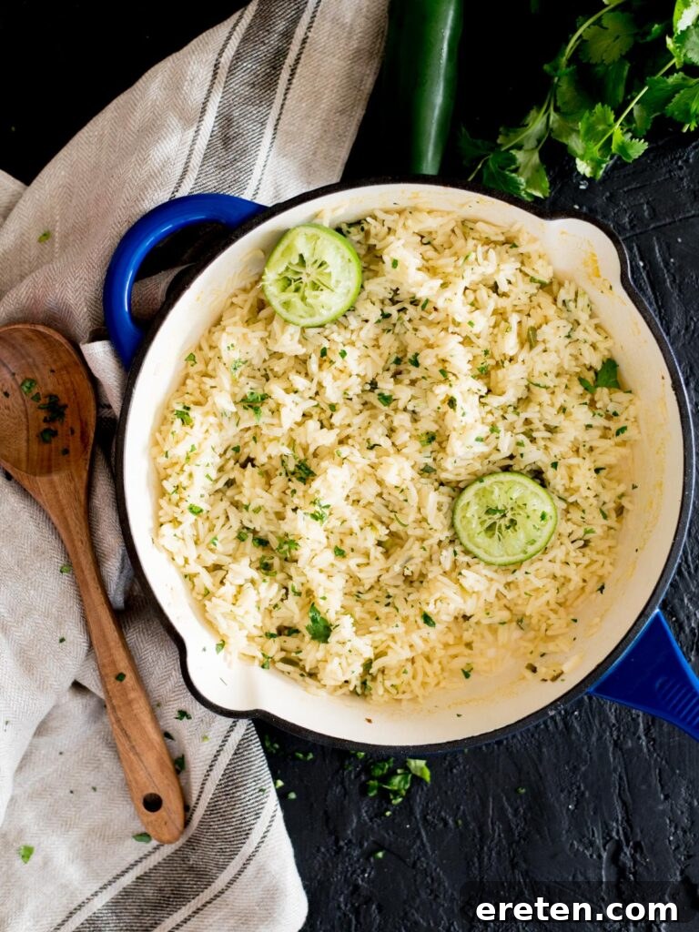 chili lime rice in a skillet topped with cilantro