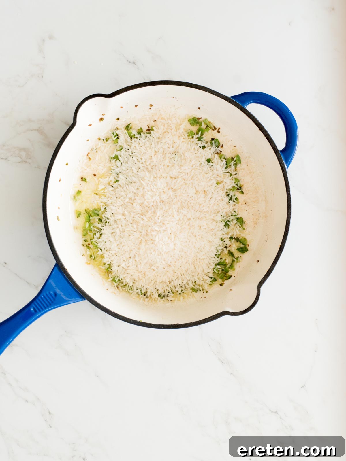 rice added to cast iron skillet