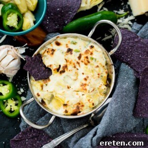 Spicy Artichoke Jalapeno Fusion 13 Jalapeno Artichoke Dip, fresh out of the oven, golden and bubbly.