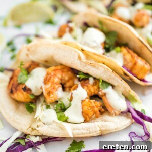 side shot of chili lime shrimp tacos