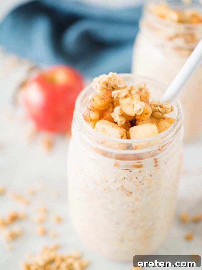 Delicious apple pie overnight oats in a glass jar, ready for breakfast