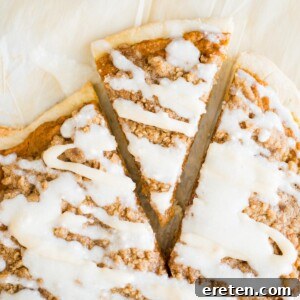 slice of pumpkin dessert pizza cut from a whole pizza