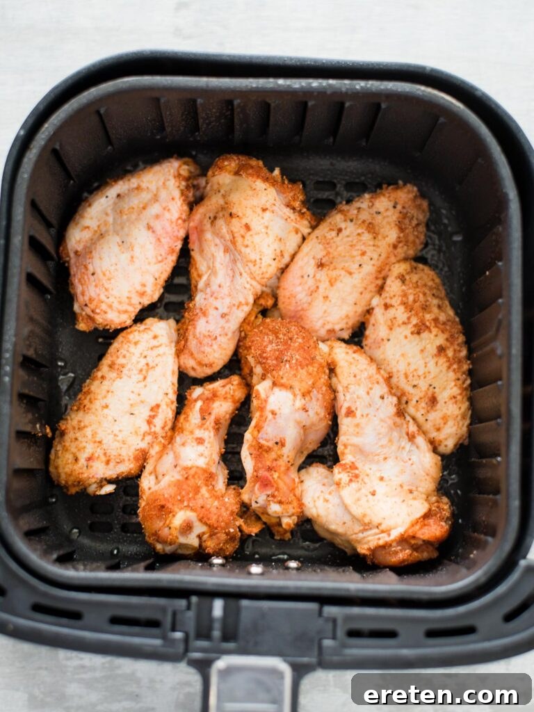 Crispy Air Fryer Dry Rub Wings 6 raw, seasoned chicken wings in the air fryer