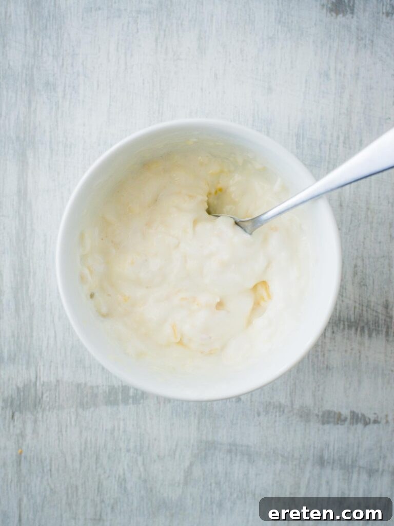 Creamy pineapple dipping sauce in a serving bowl