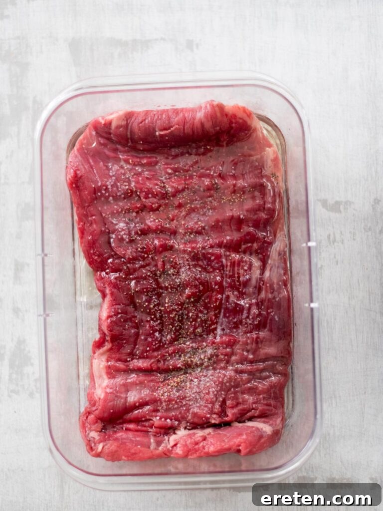 more seasonings added to flank steak