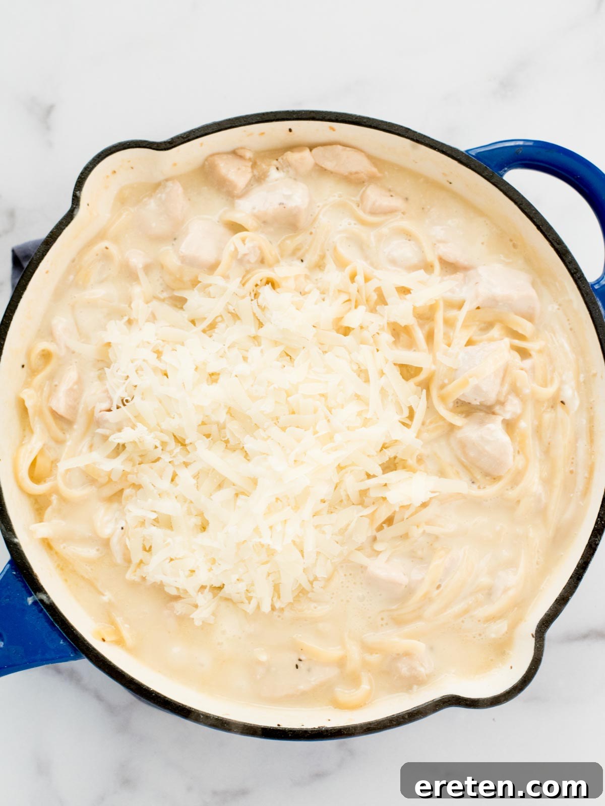 parmesan added to skillet