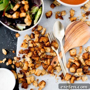 Homemade Croutons in the Air Fryer on parchment paper