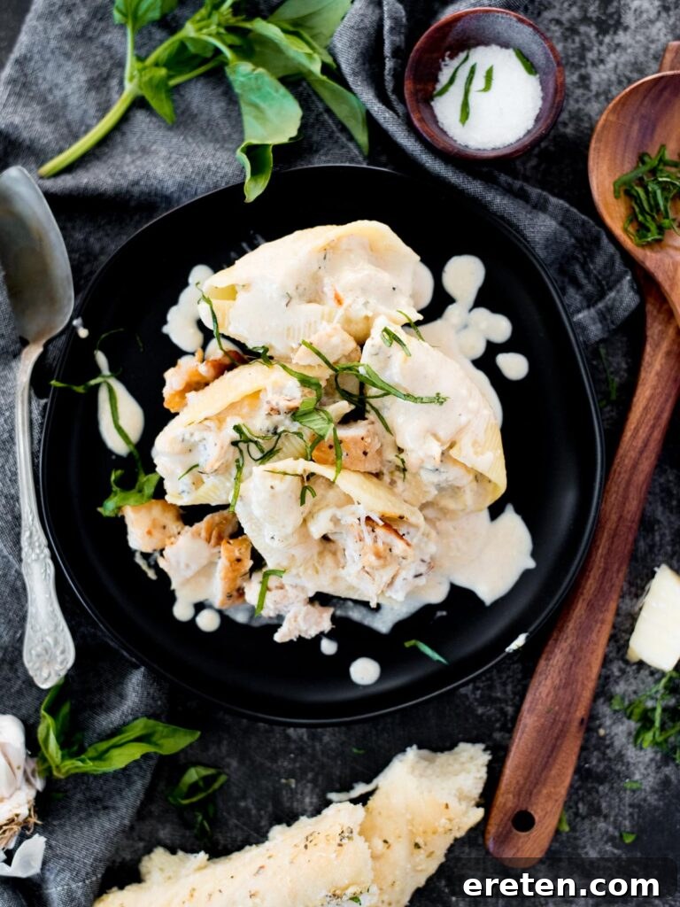 Creamy Chicken Ricotta Stuffed Shells 2 creamy chicken and ricotta stuffed shells topped with basil