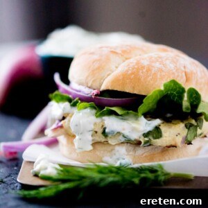 greek turkey burger with tzatziki sauce, red onion, and lettuce