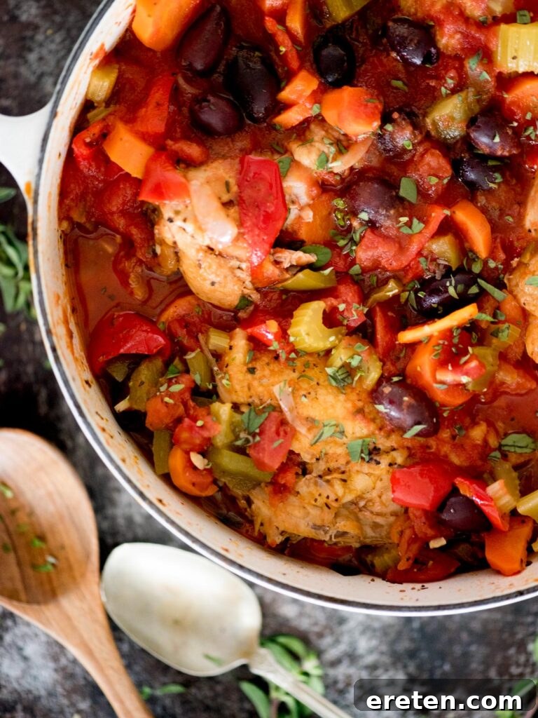 Rustic Oven Baked Chicken Cacciatore 2 baked chicken cacciatore topped with oregano in a dutch oven