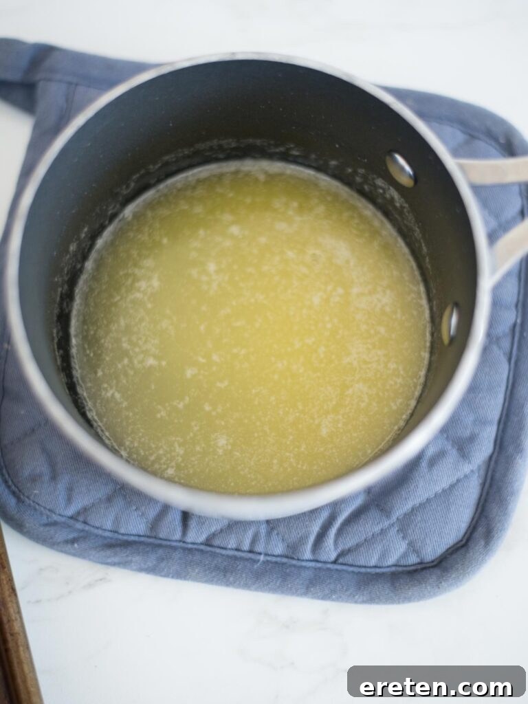 melted butter simmering in a small saucepan, ready for use