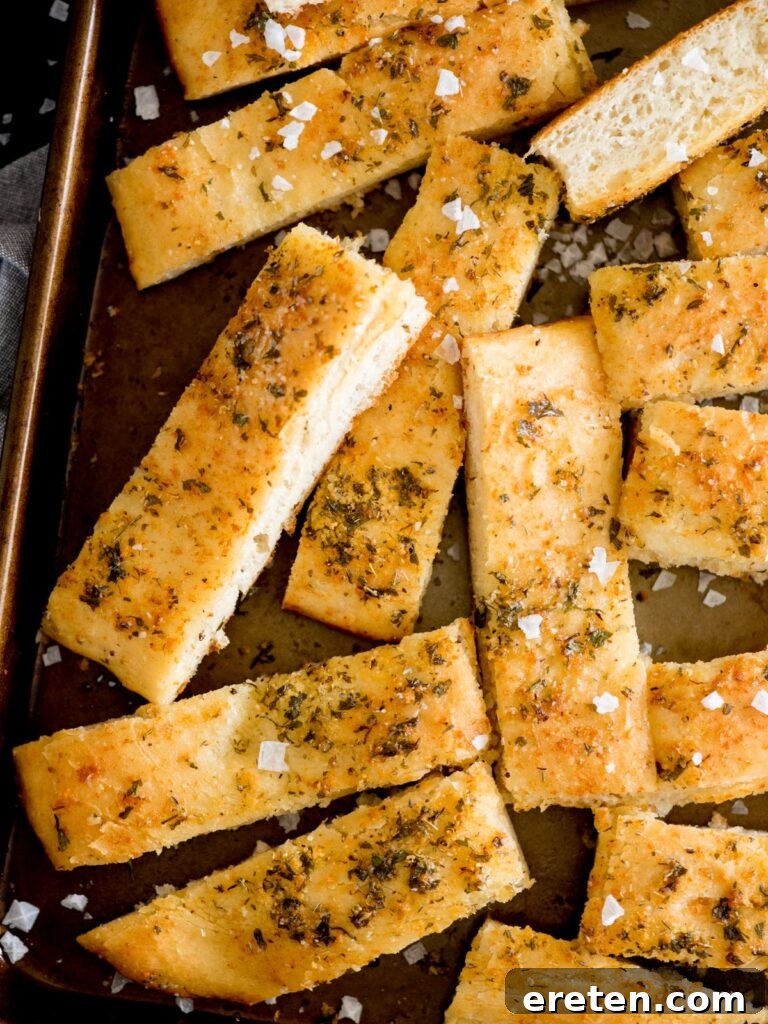 parmesan garlic breadsticks, golden brown and fluffy