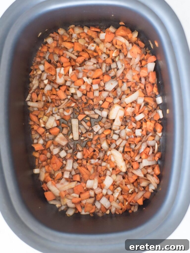 onions, carrots, and garlic combined with red wine
