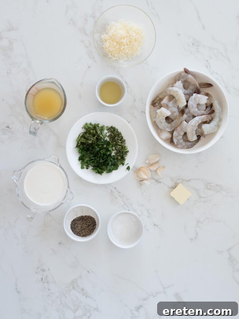 A selection of fresh ingredients including shrimp, garlic, herbs, and dairy, laid out on a kitchen counter for creamy garlic shrimp preparation.