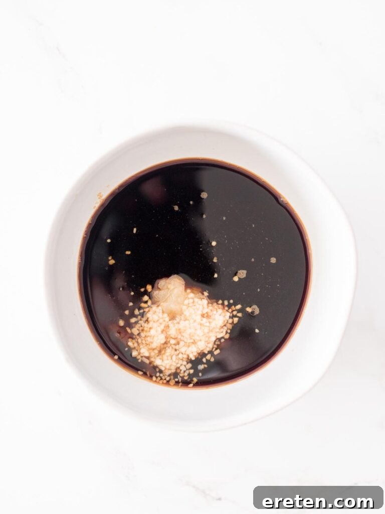 garlic, ginger, soy sauce, and brown sugar in a bowl
