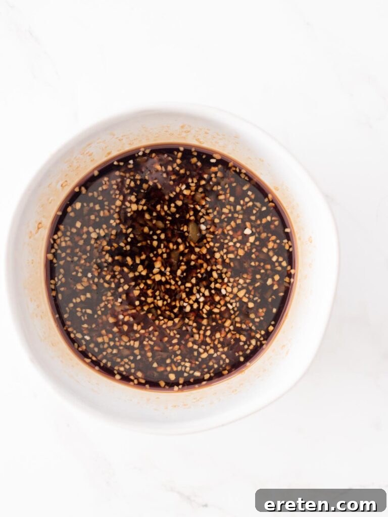honey, soy sauce, brown sugar, ginger, and garlic mixed together in a bowl