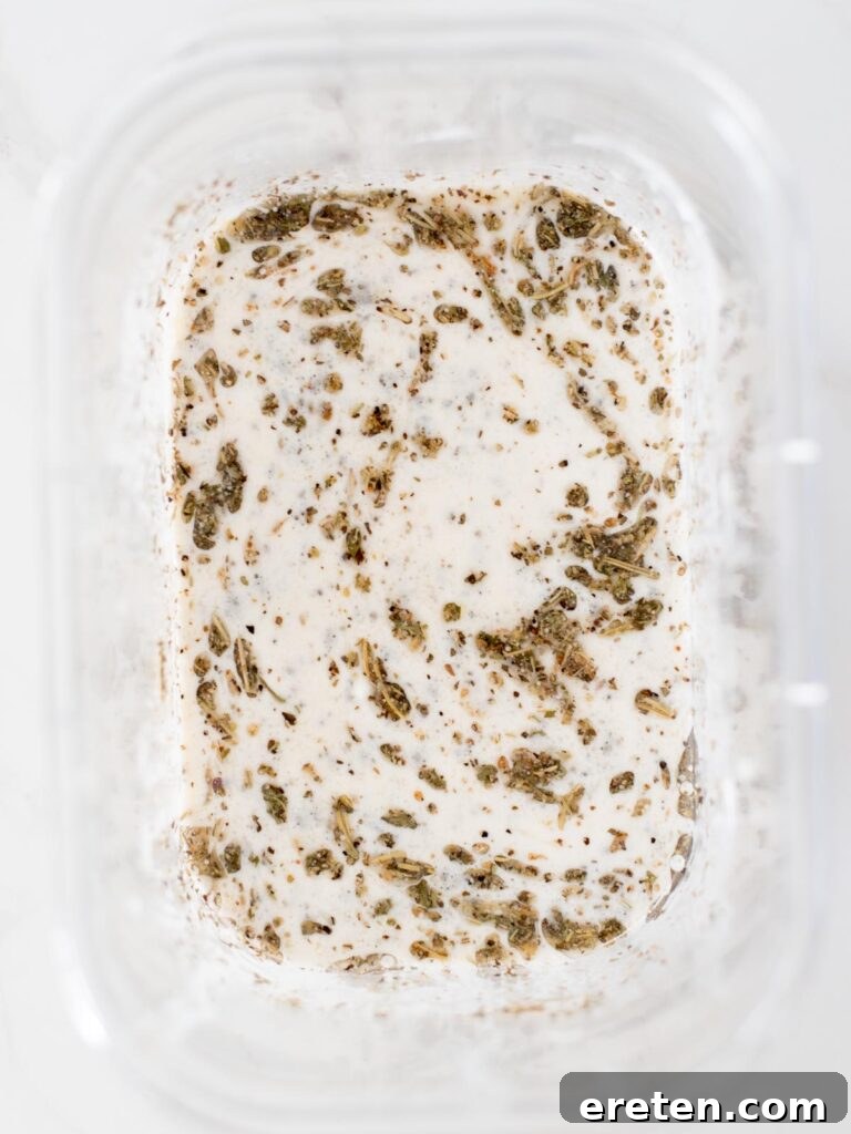 All marinade ingredients thoroughly mixed together in a bowl, creating a smooth, aromatic sauce.
