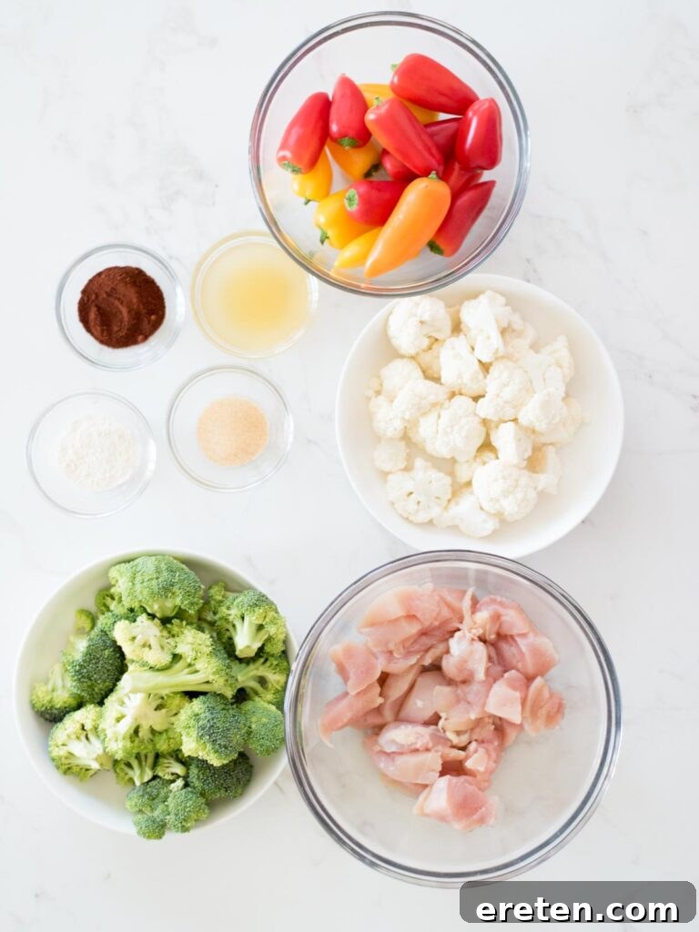 One-Pan Golden Chicken & Vibrant Veggies 3 ingredients for healthy chipotle chicken and vegetables laid out