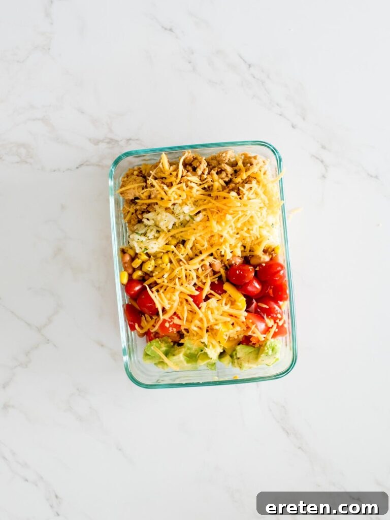 turkey taco bowls in a glass container
