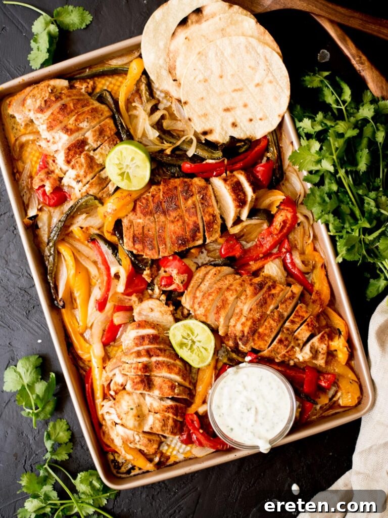 One Pan Chicken Fajita Dinner 2 sheet pan chicken fajitas with creamy cilantro lime sauce, tortillas, and limes