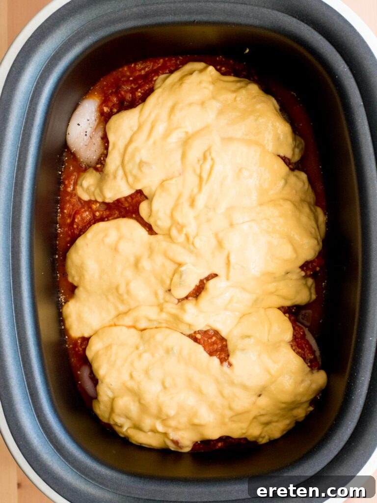 Slow Cooker Salsa Chicken with Melted Queso 6 chicken salsa and queso in crockpot