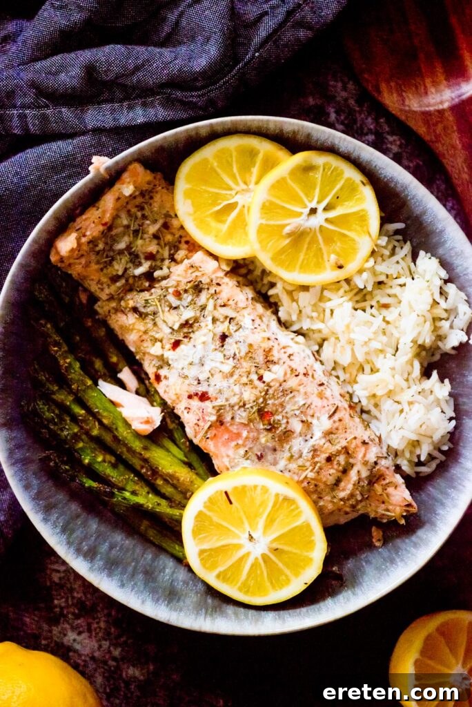 Zesty Lemon Butter Salmon Parcels 2 lemon butter salmon with rice and roasted asparagus
