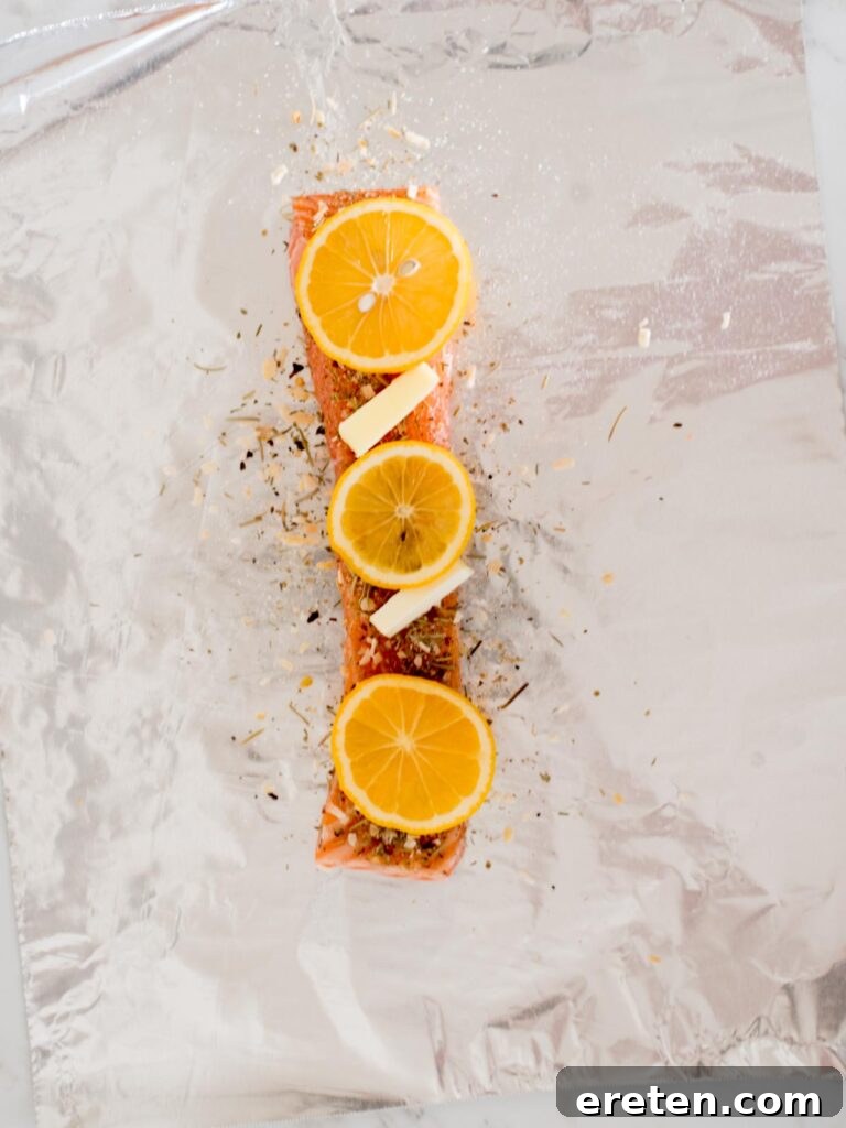 Zesty Lemon Butter Salmon Parcels 7 salmon filet with tuscan herb seasoning, butter, and lemons