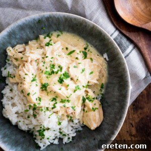 crockpot ranch chicken over rice sprinkled with parsley