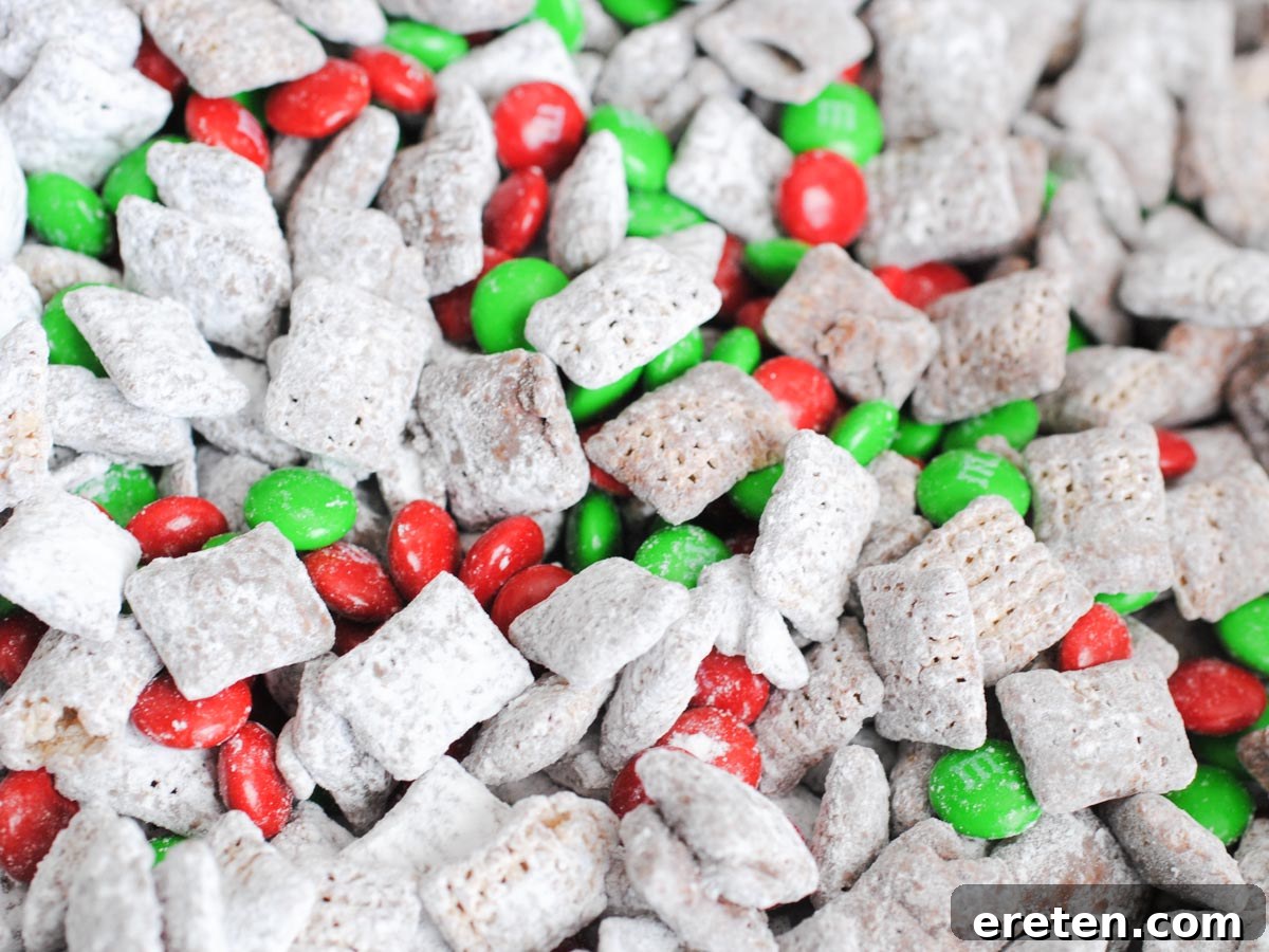 Festive Homemade Muddy Buddies 12 A generous serving of Reindeer Munch in a large bowl, showcasing its delicious appeal as a festive snack.