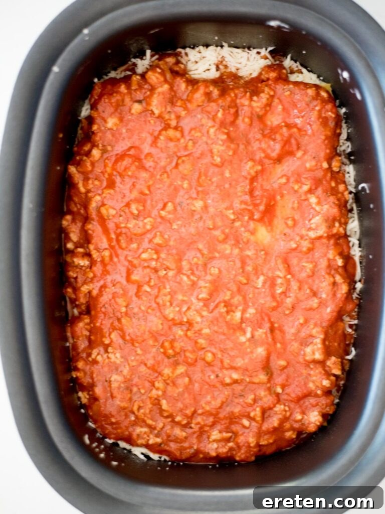 meat sauce over noodles in the crockpot
