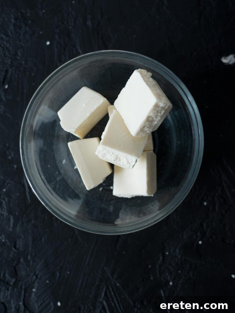 Almond bark pieces in a mixing bowl, ready for melting