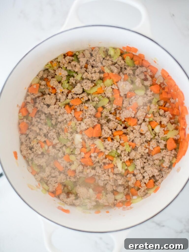 Quick and Comforting Pasta Fagioli 6 cooked turkey sausage with carrots and celery